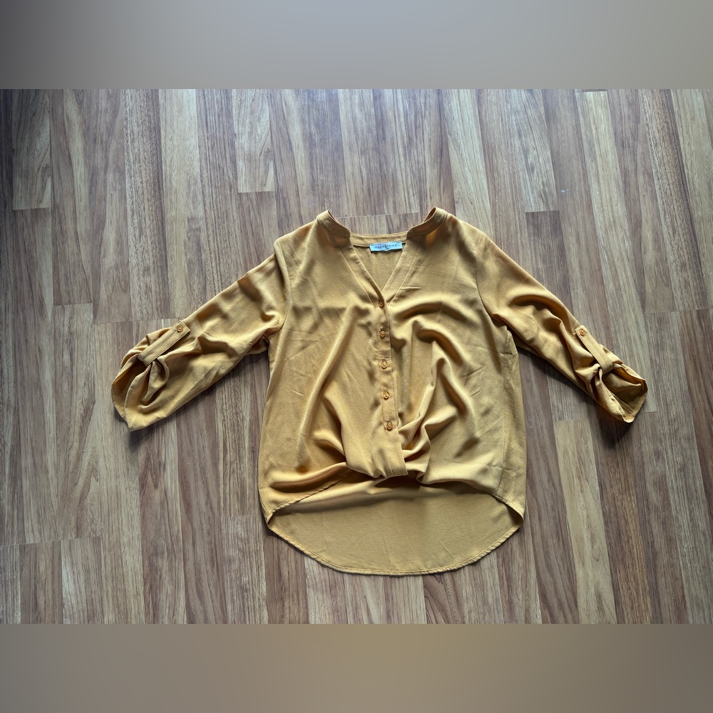 Yellow button up blouse
